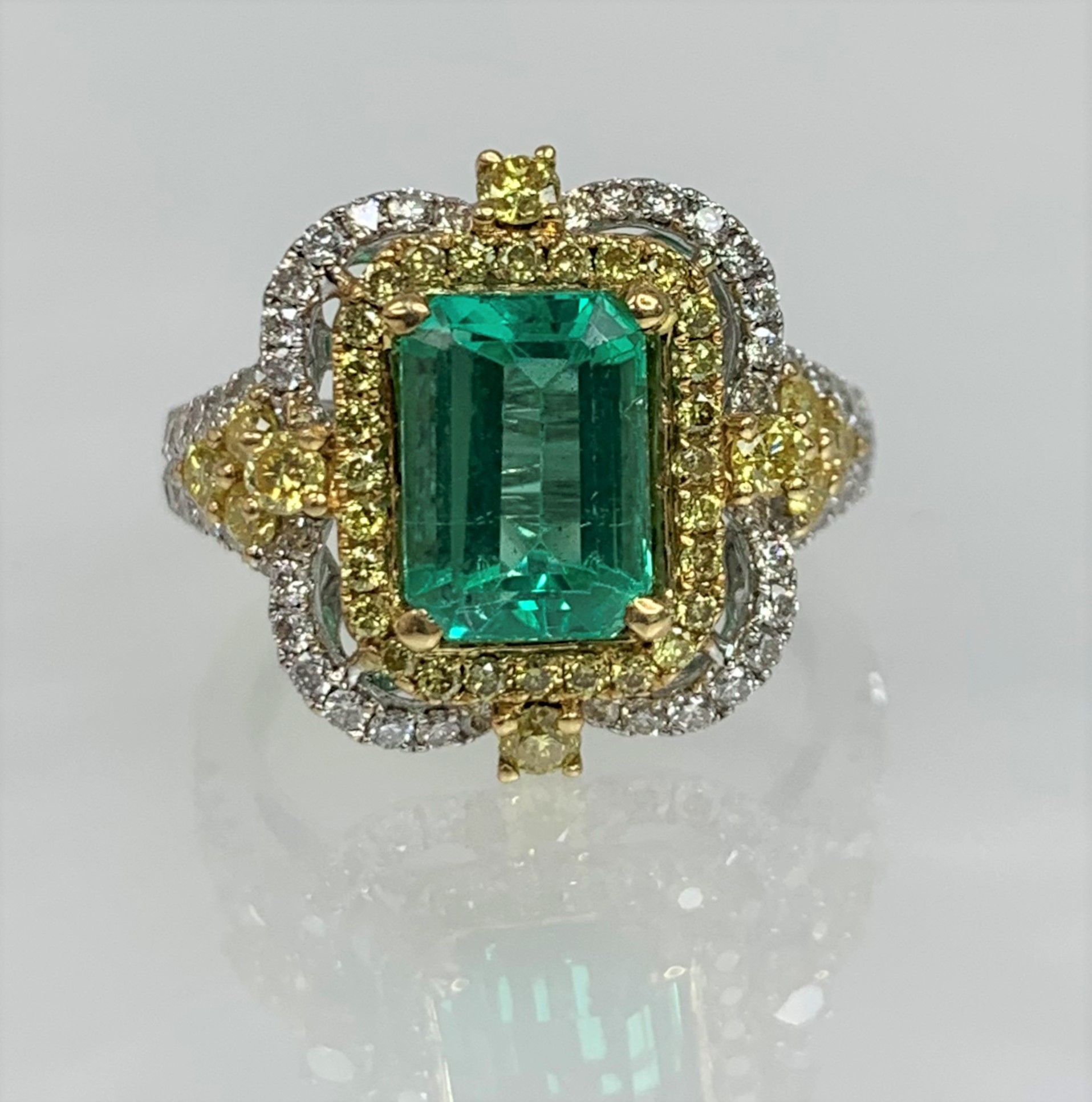18K White Gold Emerald Cut Emerald White and Yellow Diamond Ring