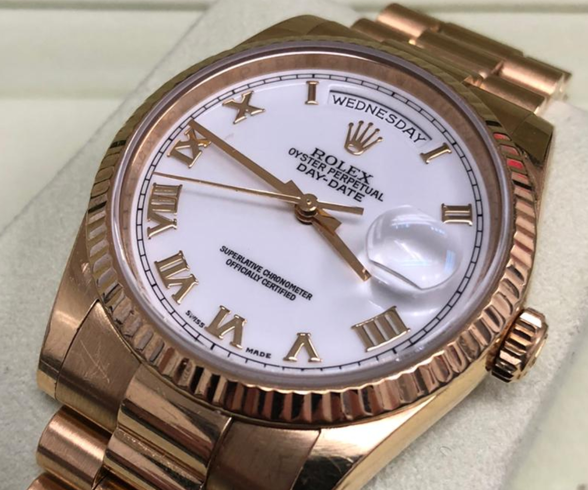 Rolex Day-Date Rose Gold White Roman Dial  Fluted Bezel President Bracelet 118238