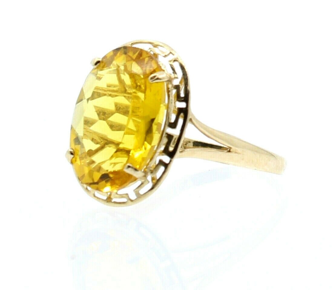 14K YELLOW GOLD OVAL YELLOW STONE LADIES RING SIZE 7