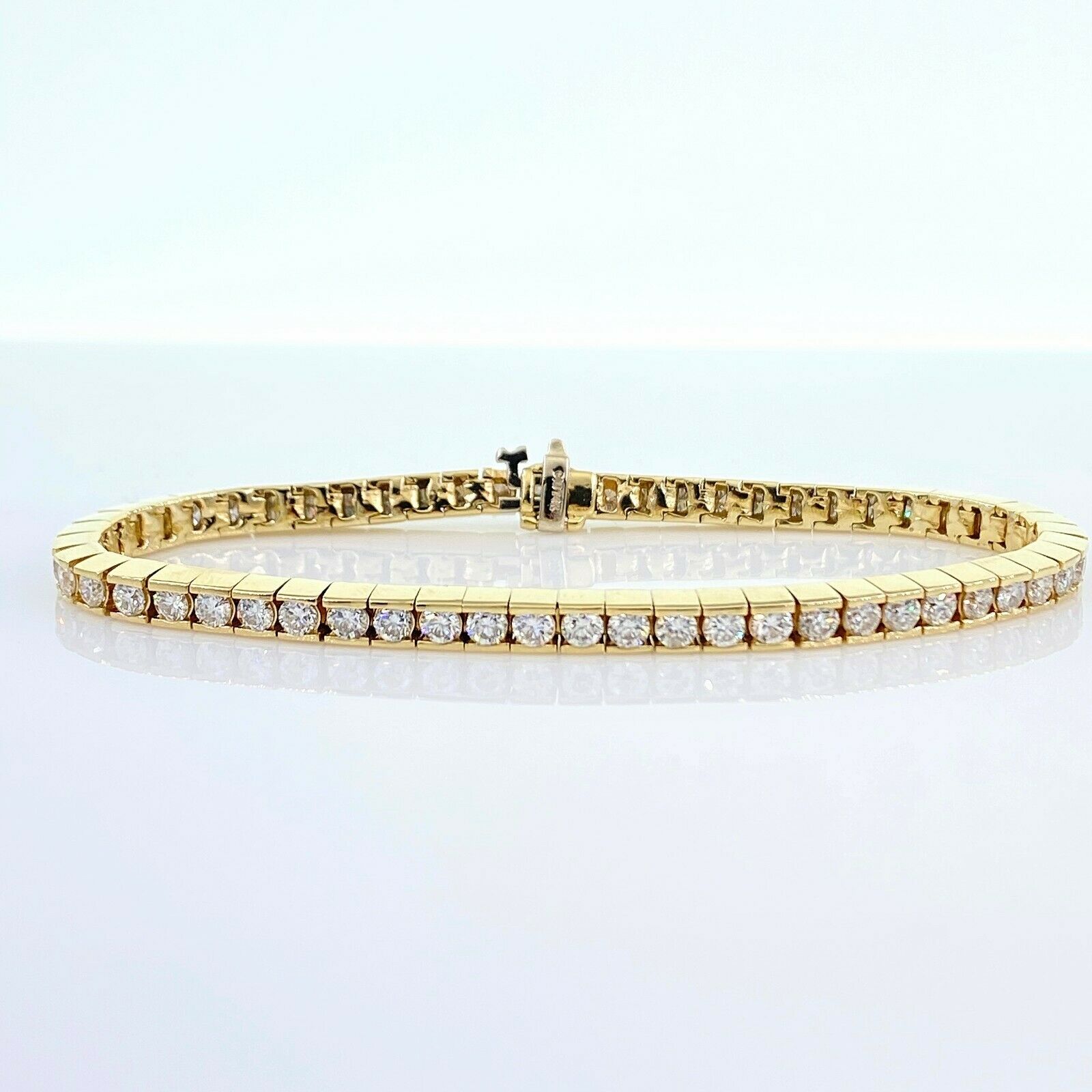 Round Brilliant Diamonds Channel Set 6.00 tcw 14K Yellow Gold Tennis Bracelet