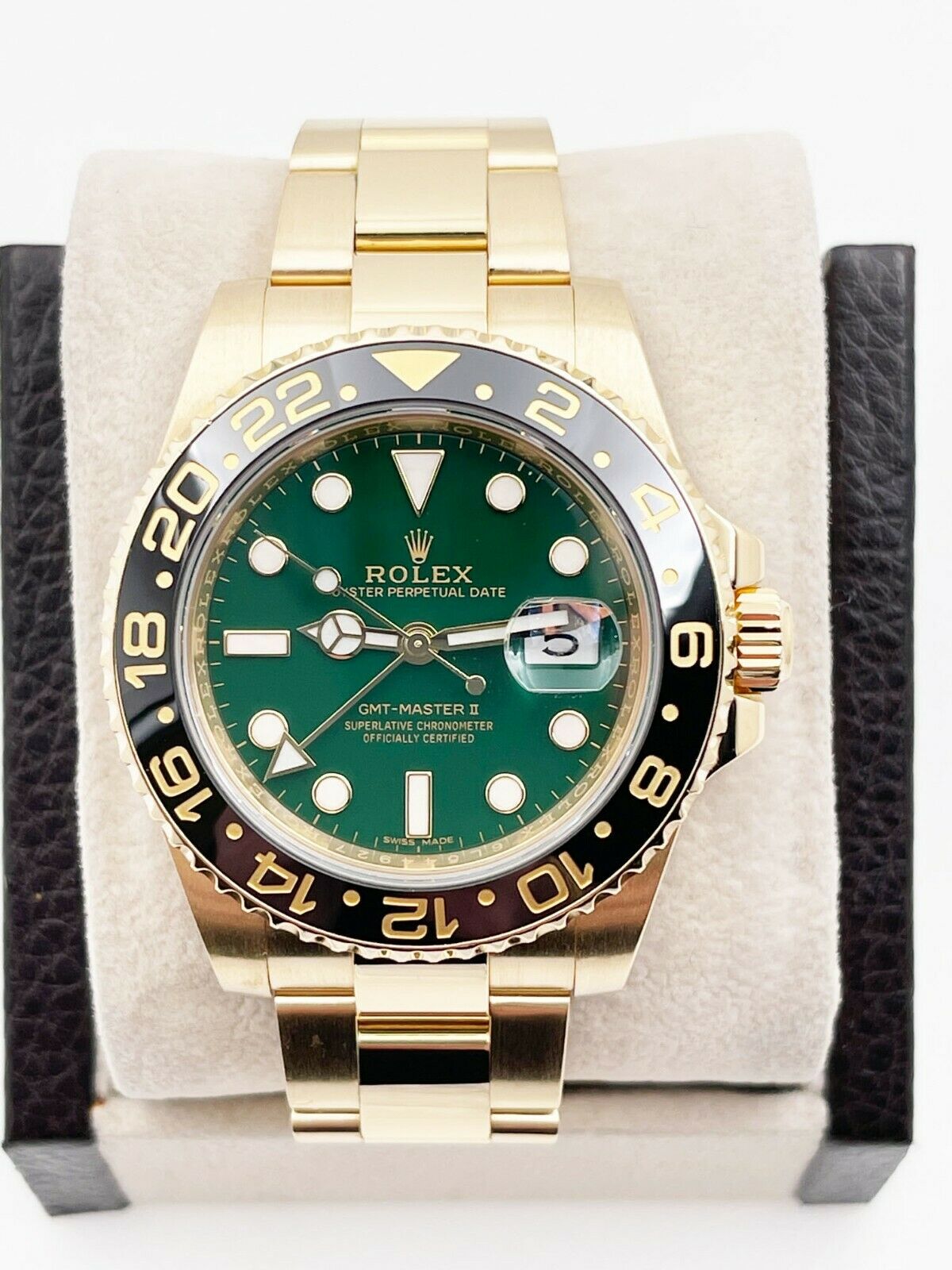 Rolex  GMT Master II Green Dial Black Ceramic Bezel 18K Yellow Gold