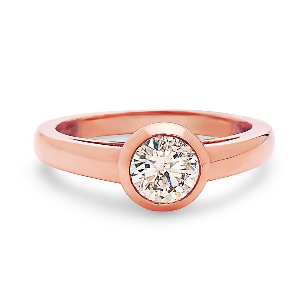 14K Rose gold bezal set cartier style solitaire diamond engagement ring.