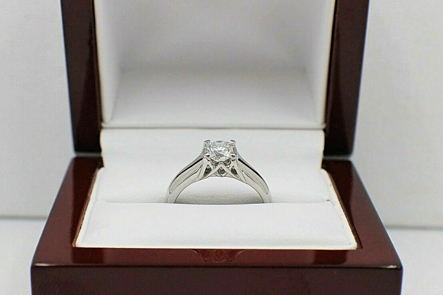Elara Radiant Platinum Diamond Engagement Ring GIA 0.71 ct I VVS2 $9,000 Retail