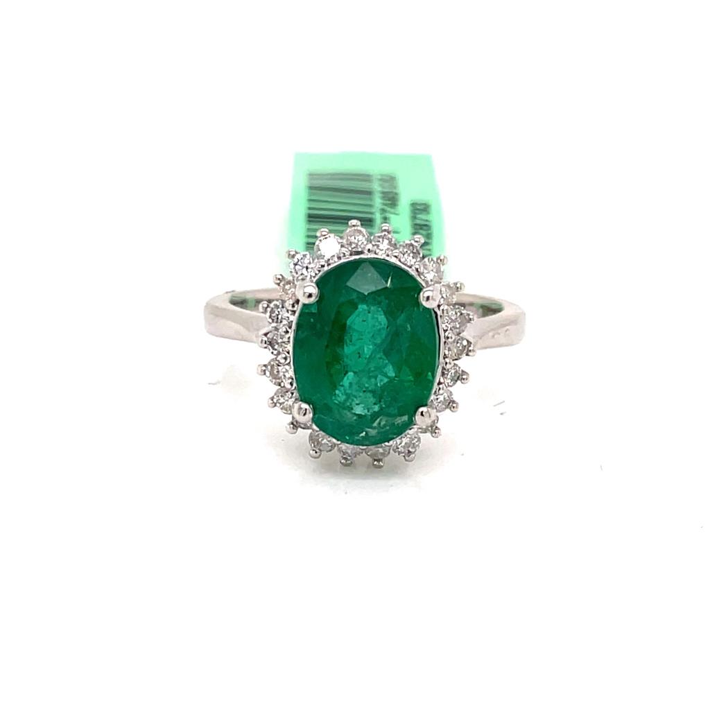 Oval-Cut Emerald and Diamond Floral Halo Ring In 14K White Gold