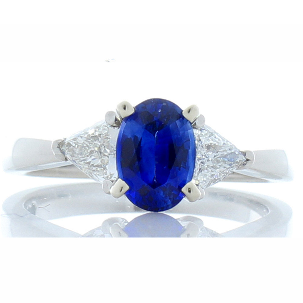 Heritage Gem Studio 0.97 Carat Oval Blue Sapphire and Trillion White Diamond Platinum Cocktail Ring