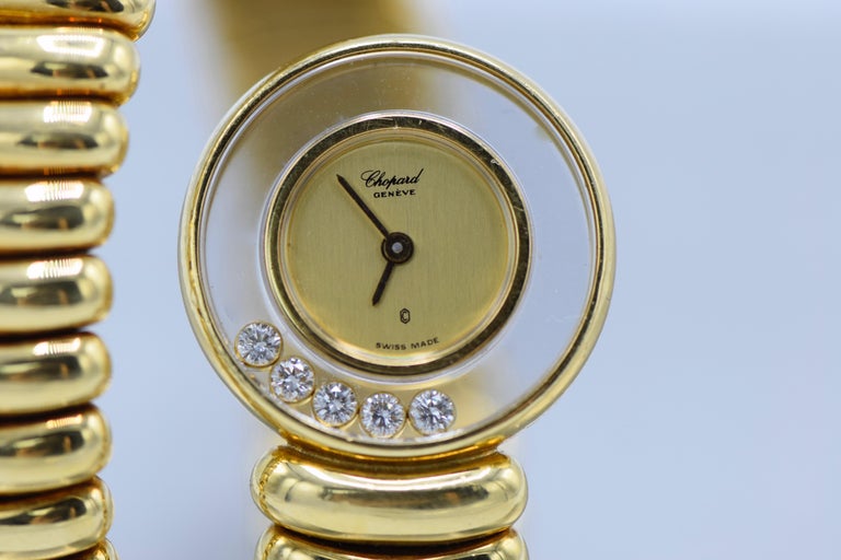 Chopard, 18 Karat Gold, Diamond, and Ruby 'Happy Diamond' Watch